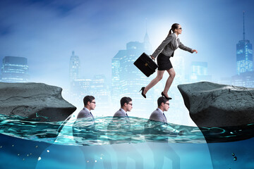 Inequal competition concept with businesswoman walking on heads