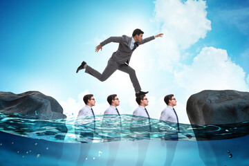 Inequal competition concept with businessman walking on heads