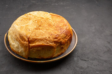 front view tasty shakh plov cooked rice inside round dough on grey desk rice meal cooking dough...