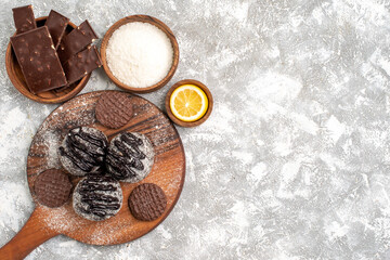 top view delicious chocolate balls cakes with cookies on white desk tea sugar cake biscuit cookie sweet