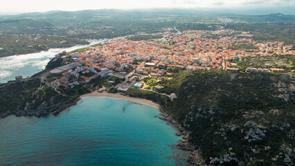 Santa Teresa Gallura is a town on the northern tip of Sardinia, on the Strait of Bonifacio, in the province of Sassari, Italy. Fhotographed from the  top with a drone