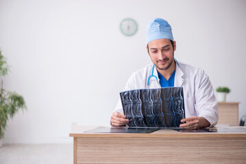Young male doctor radiologist working in the clinic
