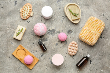 Bath bombs with accessories on grunge background