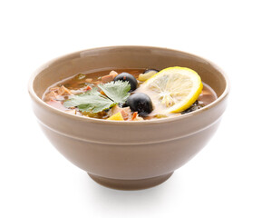 Bowl of tasty Hodgepodge soup on white background
