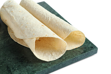 Board with thin lavash on white background