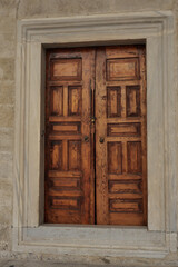 a brown wood old door in singapore 