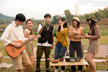 Group of young  Asian people are enjoy camping in natural campsite
