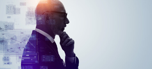 Executive man and data technology concept. Wide angle visual for banners or advertisements.