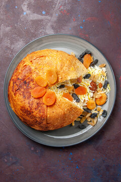 top view tasty shakh plov with raisins on dark background cooking rice food meal dough