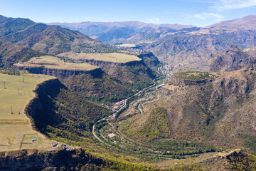 Fototapeta na wymiar Drone view of Debed river gorge, Alaverdi town and Sanahin village on sunny summer day. Lori Province, Armenia.