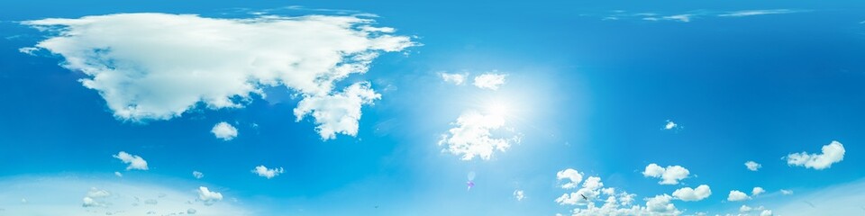 blue sky panorama with puffy clouds, for compositing in 3D graphics and aerial spherical panoramas as a sky dome