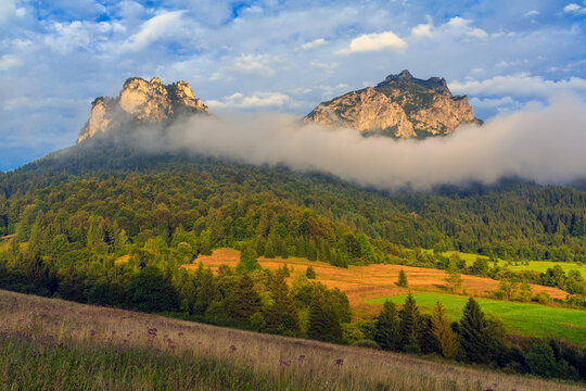 Veľk&yacute; Rozsutec (right) and Poludňov&eacute; skaly in Mal&aacute; Fatra mountain group (Slovakia) seen at sunset from &Scaron;tefanov&aacute;.