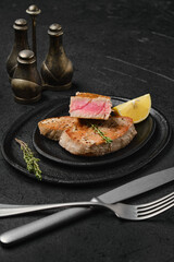 Fried tuna steak on a plate