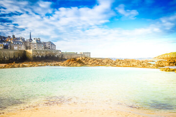 Saint-Malo old city over tidal waters , France