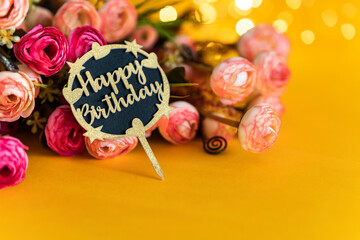 Happy birthday yellow background with beautiful flowers on the background, birthday greeting card...