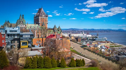 Tuinposter Quebec City skyline, architecture, buildings, view of Frontenac Castle  or Fairmont Le Chateau Frontenac in Canada overlooking the St. Lawrence River © Naya Na
