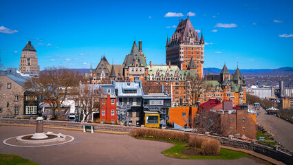 Naklejka premium Quebec City vibrant spring colors, skyline, architecture, buildings, view of Fairmont Le Chateau Frontenac in Canada overlooking the St. Lawrence River