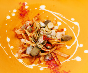 Hokkaido or butternut pumpkin soup with curry and seeds