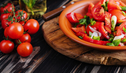 Tomato salad with cucumber, onion and parsley