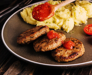 grandma cooked cutlets with mashed potatoes