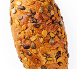 Bread with pumpkin seeds isolated on a white