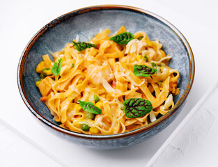 Pasta salad with grilled vegetables peas and corn