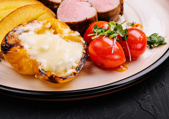 turkey tenderloin with potatoes and roasted peppers