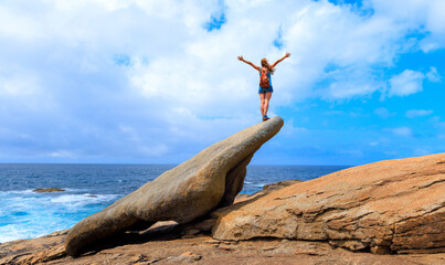Happy Hiker woman standing on peak- achievement, travel, adventure concept ( Galicia in Spain)