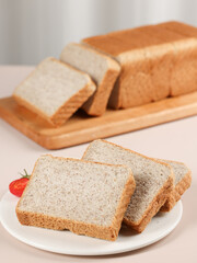 Scene with toast bread with fruit and milk, healthy breakfast, indoor kitchen photography