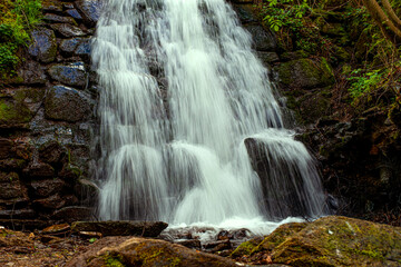 Fototapeta na wymiar beautiful waterfall in the Cindrel mountains of Romania