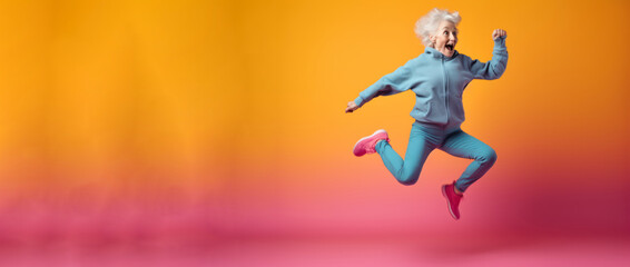 Fototapeta na wymiar Modern Aging. A playful, energetic portrait of an older woman in workout clothes jumping for joy on a colorful gradient background. Generative AI