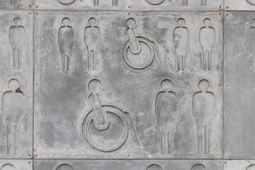 stone tiles with symbols of people of different status