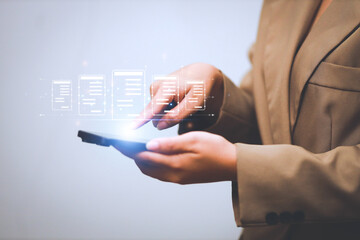 Business woman touching virtual monitor with document for online approve paperless quality assurance and ERP management concept.