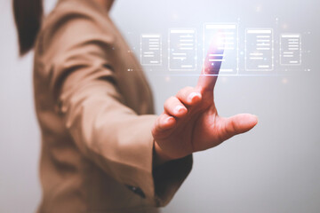 Business woman touching virtual monitor with document for online approve paperless quality assurance and ERP management concept.