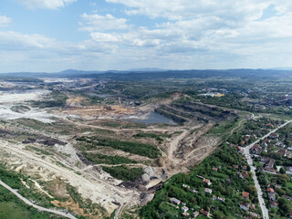 Fototapeta na wymiar The abandoned, dead city near the Kolubara pit on coal mining by the open way. Drone view Lazarevac, Serbia
