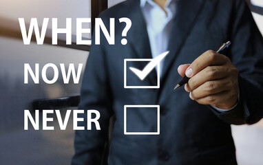 The business man and when question  checks the now box and unchecks the never box. It is a decision to start taking action immediately without waiting. way to success concept