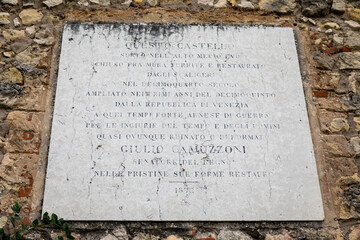 Bricked-in memorial plaque in the Castello di Suave in the town of Suave in the province of Verona in Italy.