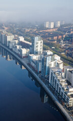 Fototapeta na wymiar Modern high rise flats at new development on waterfront