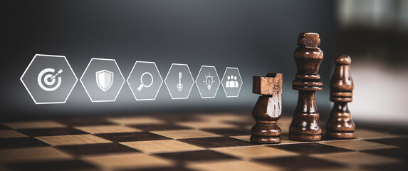 King chess pieces on teamwork with strategy icons concepts of leadership or wining challenge battle...