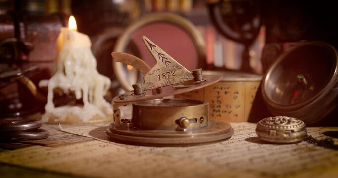 Vintage style travel and adventure. Vintage old compass and other vintage items on the table.