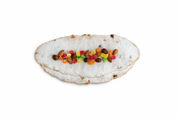 Delicious Christmas stollen isolated on a white background. Traditional German Christmas pastries. Close-up, top view