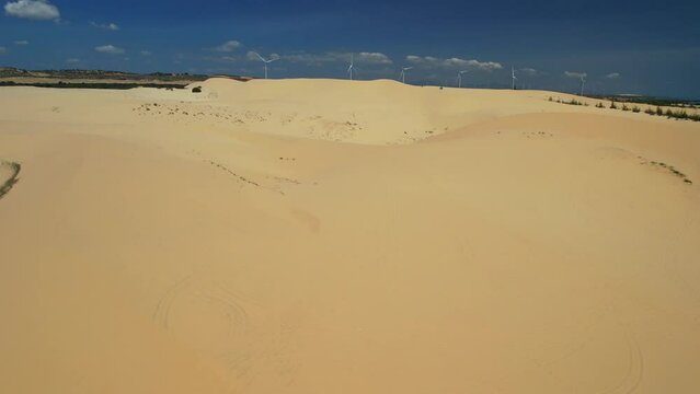 Stark geographical contrast between sand and water near Mui Ne, Vietnam. Mui Ne Desert of Vietnam is a desert in Southeast Asia