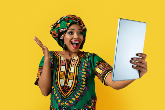 Happy Young Pretty Black Woman Holding Digital Tablet