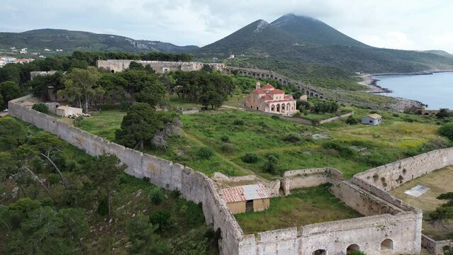 View from the historical castle New Navarino or Niokastro, located near the entrance of the port of Pylos. Messenia, Greece. Centered the church of The Transfiguration of Jesus