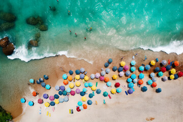 Generative AI illustration of Colorful beach umbrellas on a sunny day