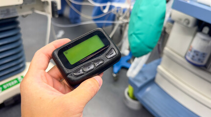 Hospital work pager and technology symbolize efficient communication and coordination between medical professionals, ensuring timely and effective patient care