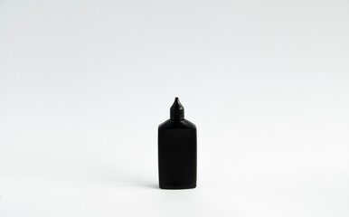 Mock up unbranded black bottle of finish line dry bicycle lubricant. Bicycle care, bicycle chain care.