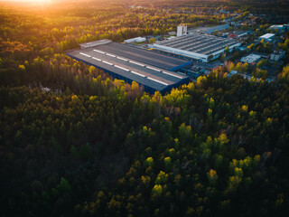 An industrial giant glows in the warmth of the setting sun. The aerial shot captures the magnitude...