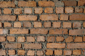 Red Brick wall masonry background. Construction bricks.