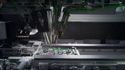 printed circuit boards production factory. Assembling the board.